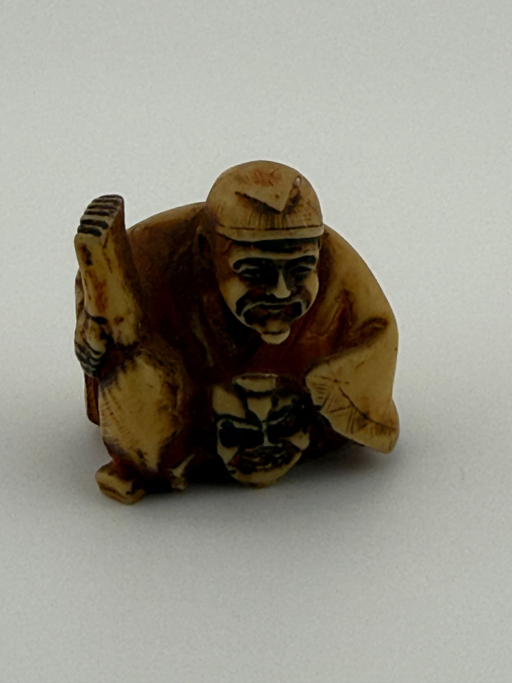 Antique Japanese Netsuke - Crouching Man with Rake, Bone or Ivory Substitute, Unsigned, 1.5"